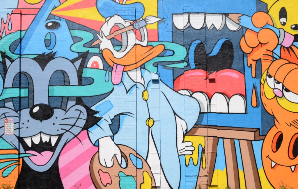 part of a mural by Greg Mike