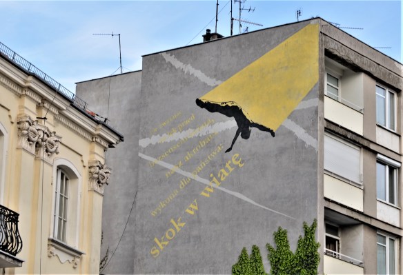 top part of mural of man falling