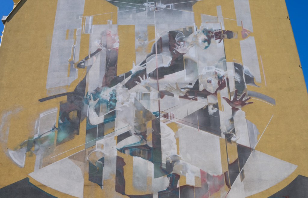 close up of a mural by tone in Lodz Poland