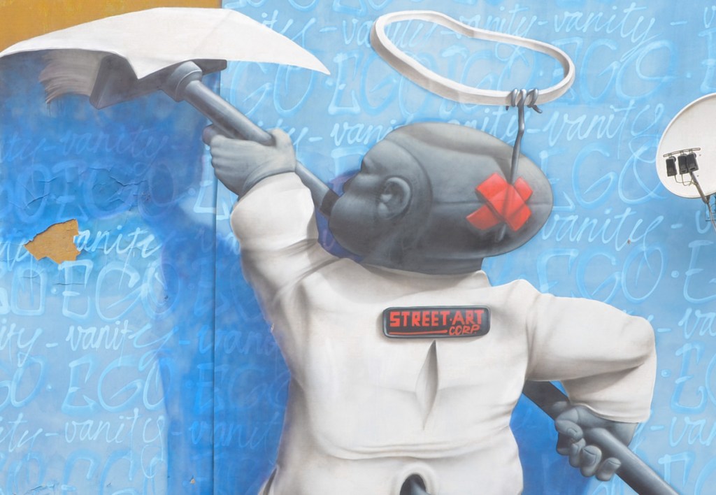 close up of character in cart 1 mural about wall papering in blue