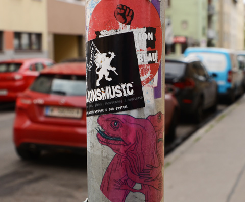 graffiti sticker on a pole