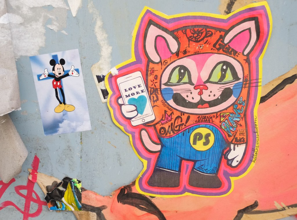 Mickey mouse on a crucifix graffiti