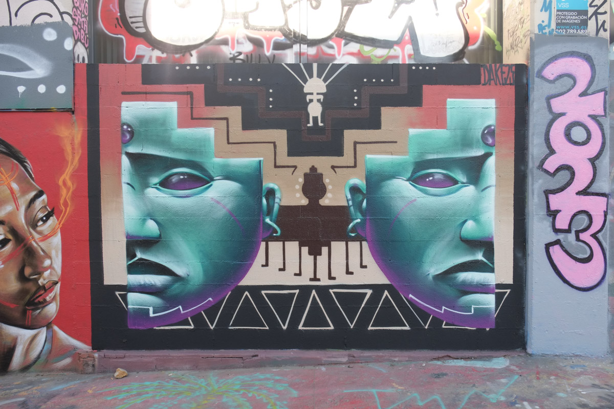 mural by dake25, of two halves of a face