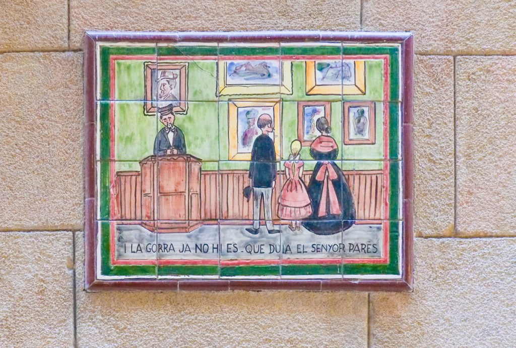 20 ceramic tiles together, with a painting on them, picture of man, woman & girl in pink dress looking at pictures on the wall of an art gallery while the owner looks on. 