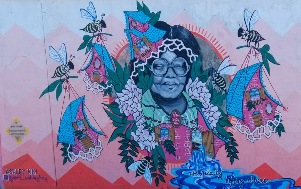 mural on an underpass, portrait of a black woman