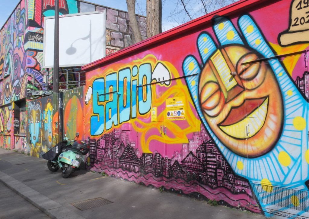 mural with word sadio in it, tribute in memorium moral