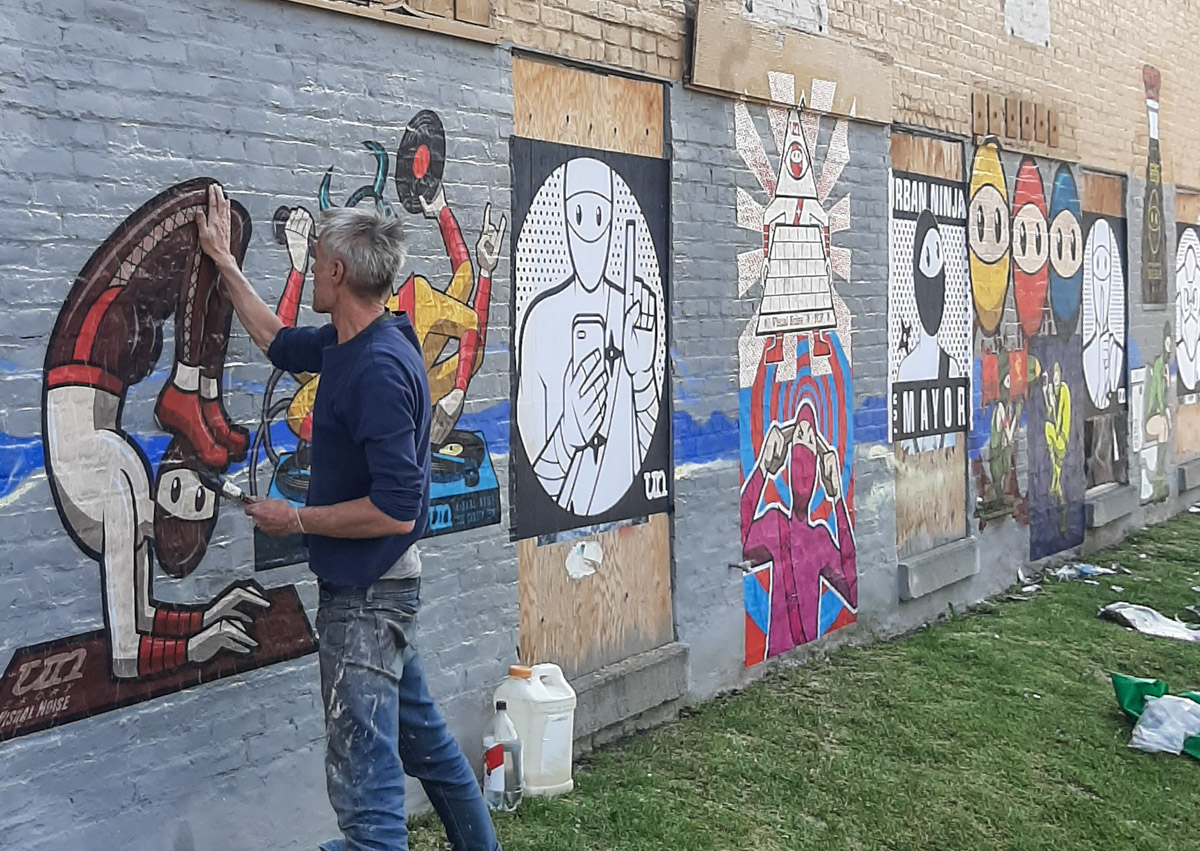 wheat paste anti gallery installation, may 2023, t-bonez character and urban ninja squadron 