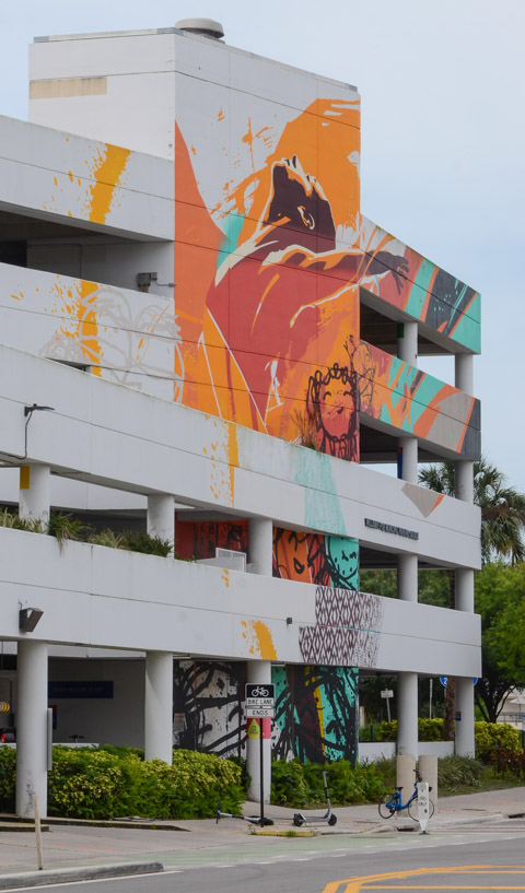 tall mural on 4 or 5 storeys of a parking structure