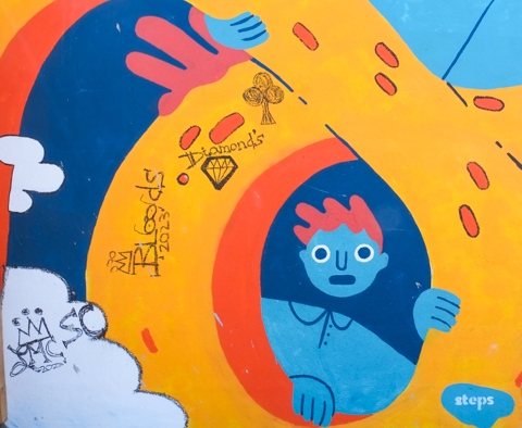 part of a mural, a boy painted in blues