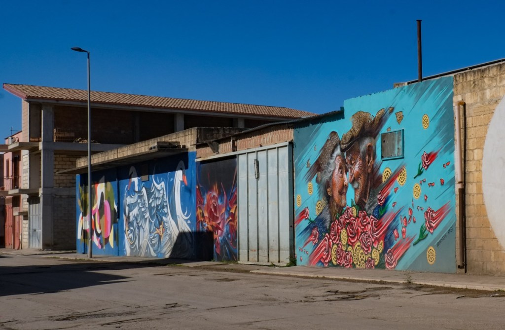 wall with murals on it