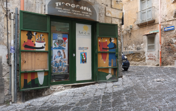 panels by a store, with street art