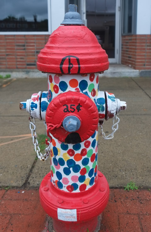 fire hydrant painted like a gum ball machine full of gum balls, 25 cents, 