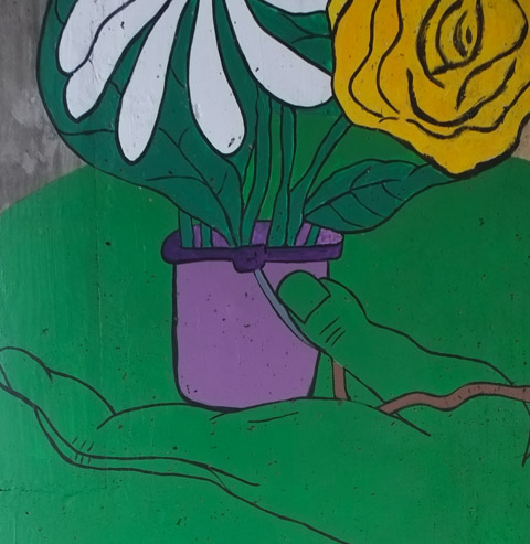 part of a larger mural, green hand holding a purple flower pot