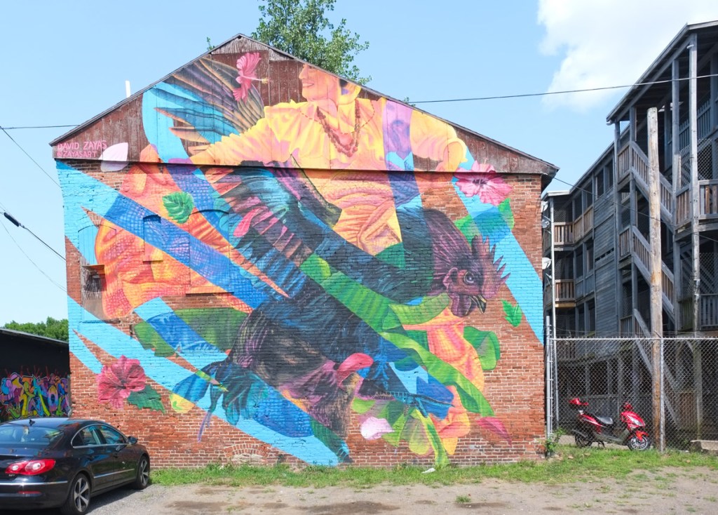 mural by david zayas, woman dancing, rooster