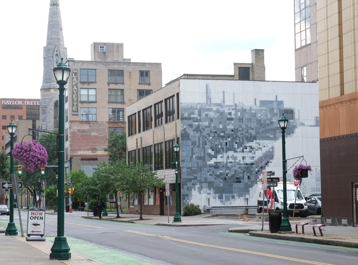 downtown syracuse new york mural composed of qr codes, shades of grey