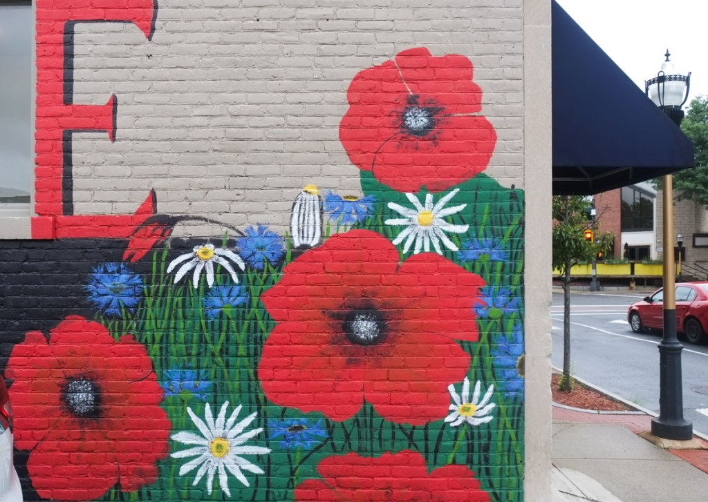 red poppies in a mural