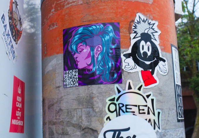 stickers on a pole