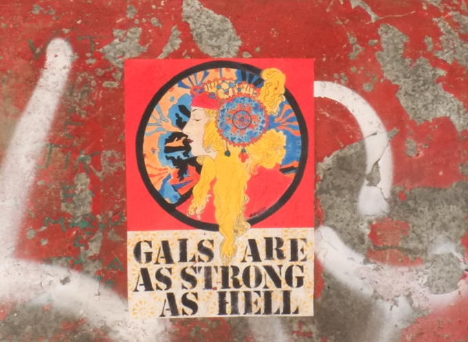 sticker that says gals are strong as hell
