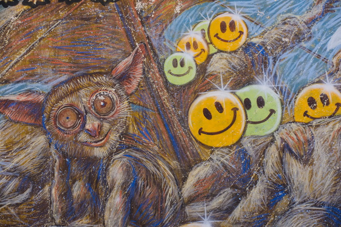 hairy gremlins with big ears and impish grins, and happy faces, in a mural