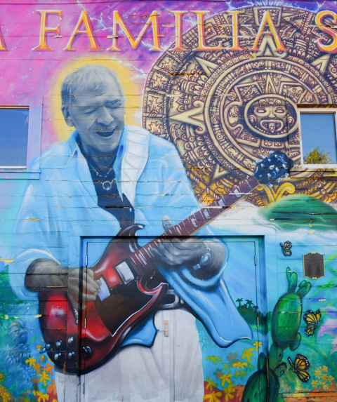 Large 60 foot mural in Mission District celebrating the Santana family,