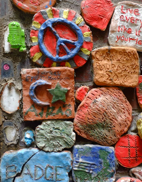 close up of some of the ceramic pieces created for the legacy wall