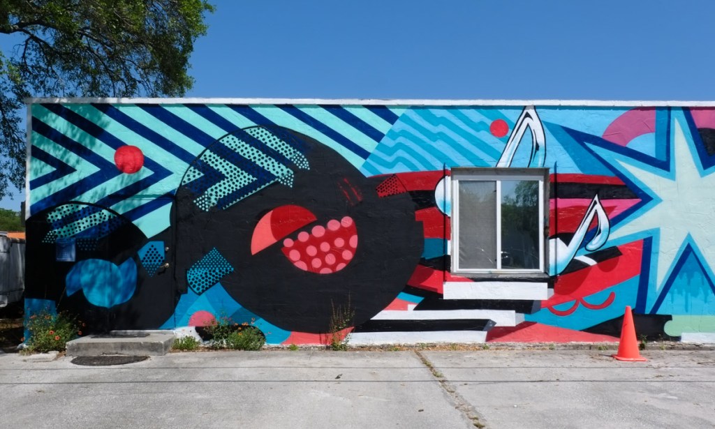 mural in bright colours, music theme, microphone, record album, by straight edge creative