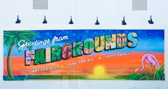 postcard style mural with the word fairgrounds, each letter has an image in it