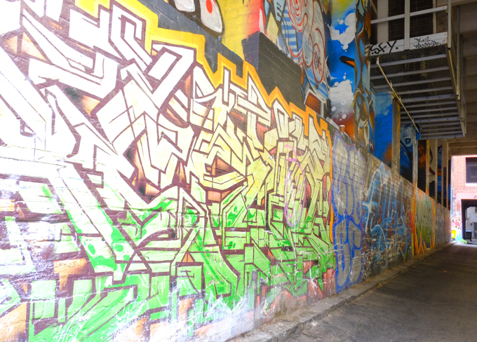 tags, text, and spray paint, in a melbourne alley or lane