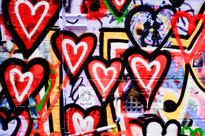 spray painted street art hearts in Hosier Lane, in many colours