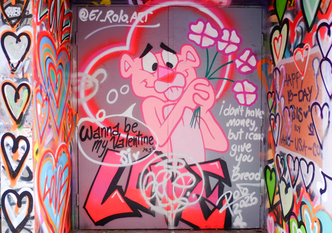 Pink panther painting in an alley