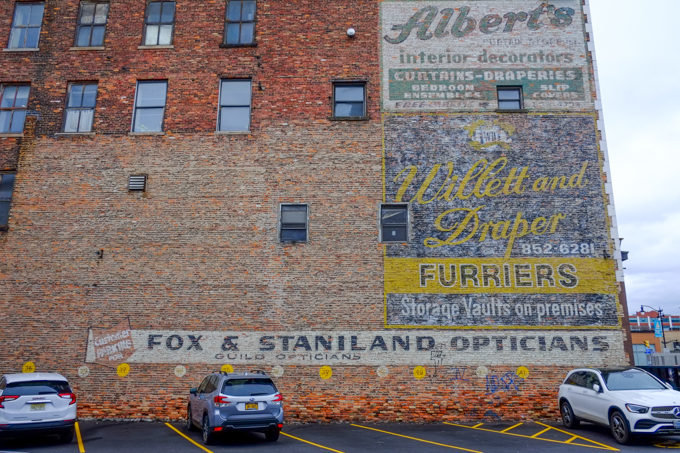 old advertising sign on the side of a brick building, Main street, Buffalo 