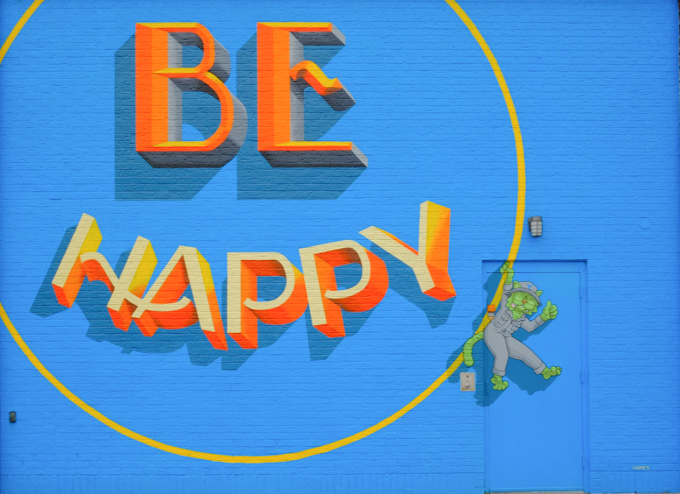 large painting outdoors, part of Albright Knox's project Cobblestone Commons