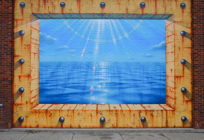 large painting outdoors, part of Albright Knox's project Cobblestone Commons