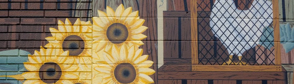 part of a market scene in a mural, a bunch of sunflowers, a white chicken in a cage