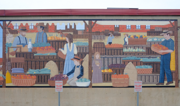 part of a mural by Penelope Duchesne of a market scene from early in the 1900s