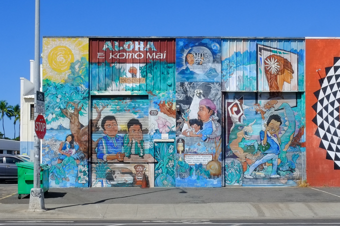 large mural on the side of a building in honolulu