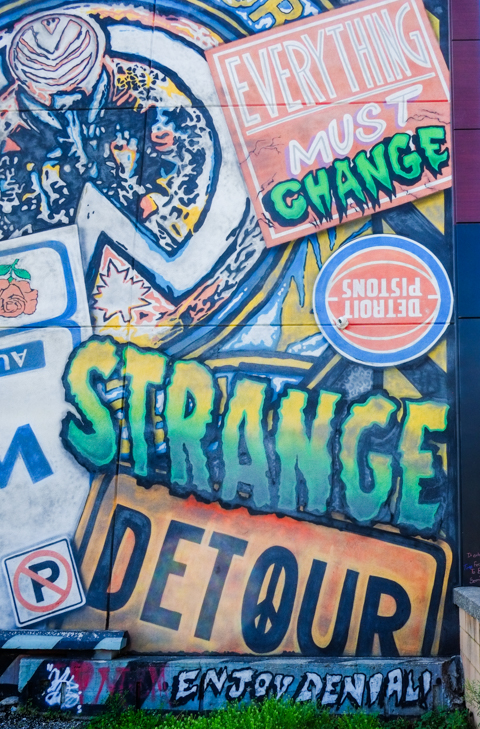 part of a Windsor themed mural by denial beside a parking lot in downtown windso