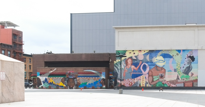 two murals at Adam Clayton Powell Jr. Plaza.