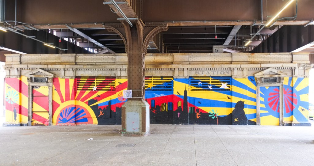 emural under the railway tracks by an old station entrance