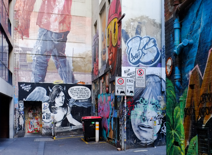 street art in ACDC lane, central Melbourne, portraits of musicians at the end of the alley