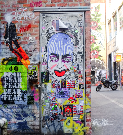 street art in ACDC lane, central Melbourne, stickers and paste ups, Christmas theme