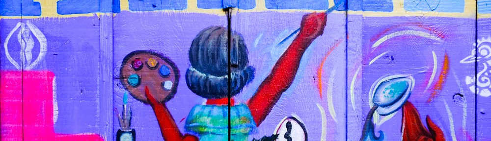 balmy lane mural, san fran, image is of a young girl painting on wall, holding palette