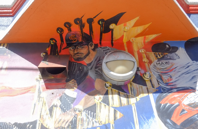 part of a mural, baseball players, with pennant flags