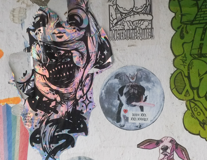 paper paste-ups graffiti  on a wall in cologne