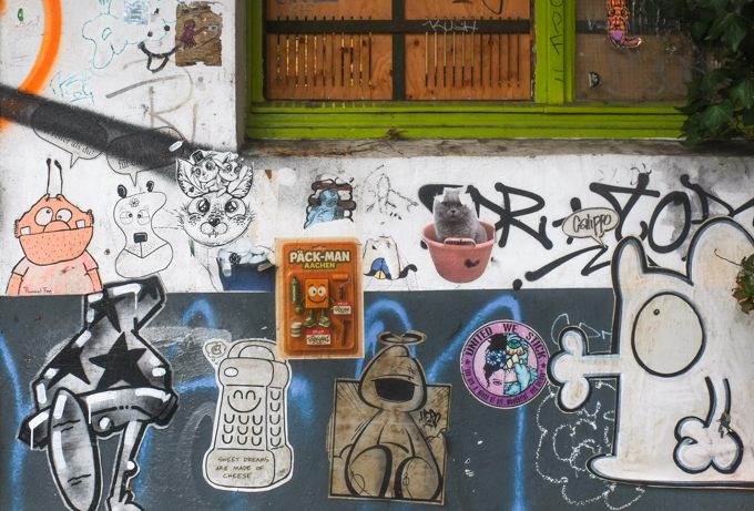 paper paste-ups graffiti  on a wall in cologne