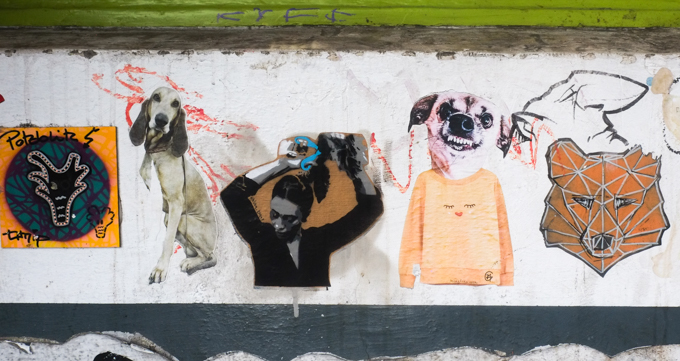 paper paste-ups graffiti  on a wall in cologne