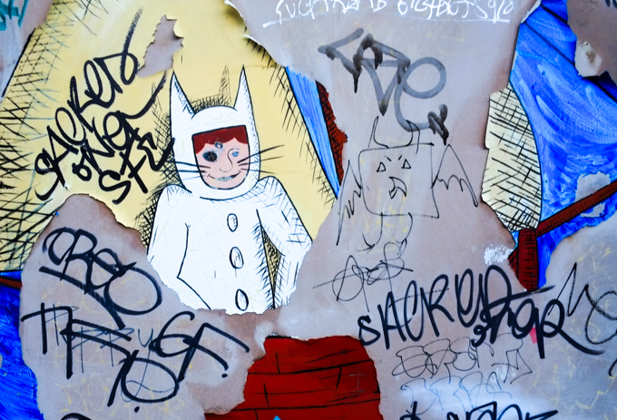 mural based on the character Max from the book Where the Wild things are, boy dressed in white wolf suit 