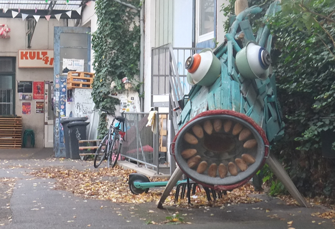 street art on Hochstadenring in Bonn Germany, sculpture of a big mouthed fish made from found objects