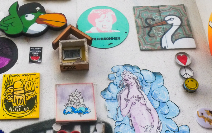 slaps, stickers, and other pasteups on a wall Heliosstrasse in Cologne