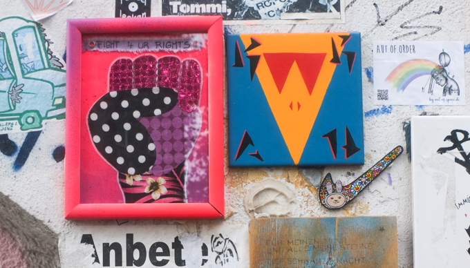 slaps, stickers, and other pasteups on a wall Heliosstrasse in Cologne